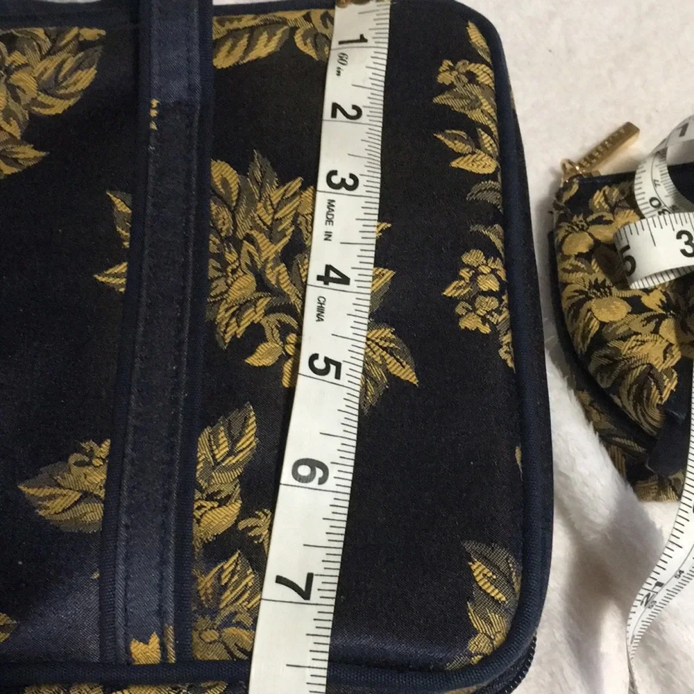 Celebrity travel bag and matching makeup bag. Navy blue with gold flowers